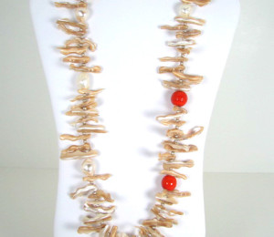 A Necklace of Champagne Abalone Sticks and Orange balls