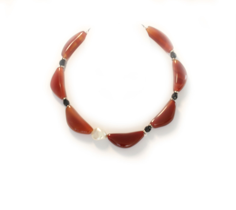 A Choker of Quarter Moon Shaped Rust Agate beads with White Pearl